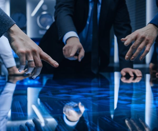 diverse,team,of,government,intelligence,agents,standing,around,digital,touch